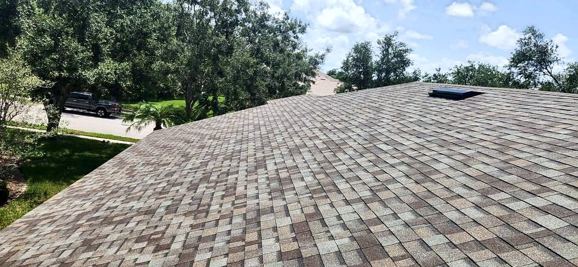 Owens Corning Duration Driftwood shingle roof installed by Providential Roofing in Florida